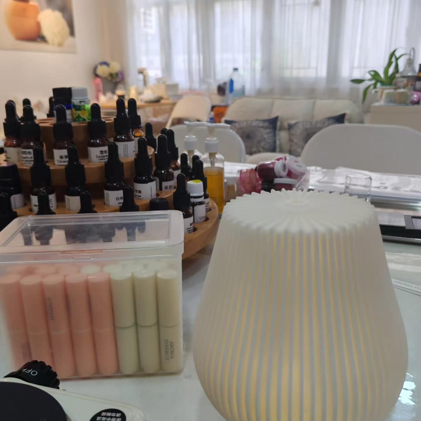 Aroma Synergy Hong Kong studio — calm consultation space with essential oil library and handmade products